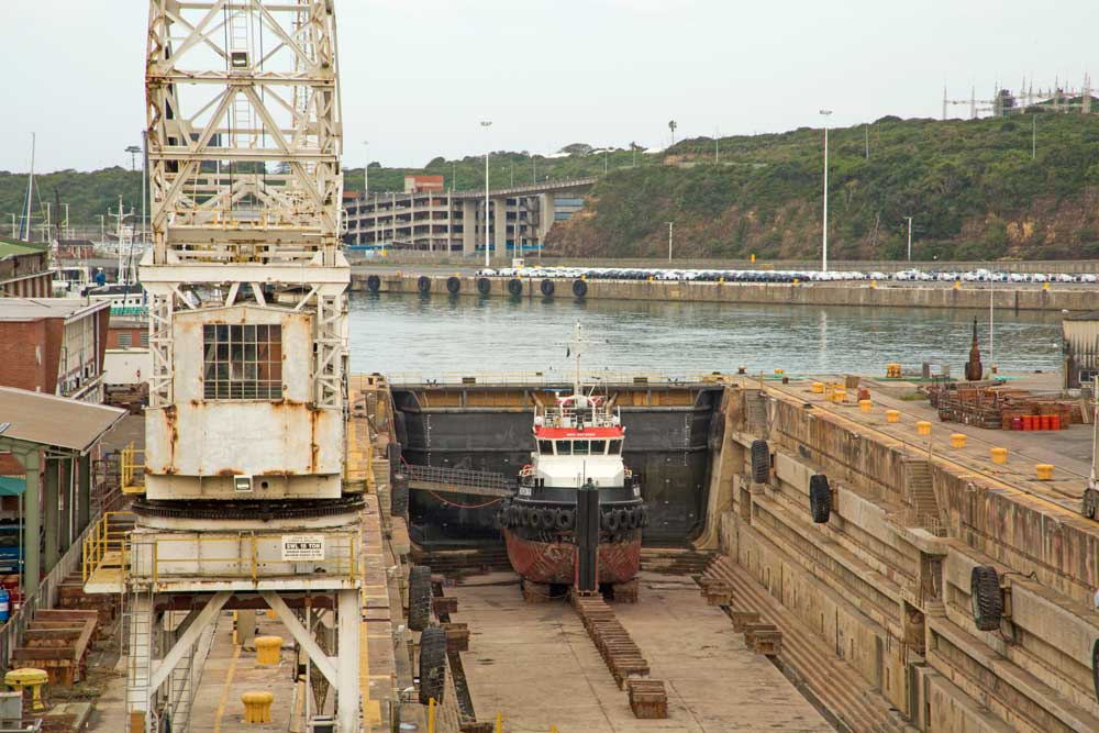 East London harbour dry dock facility showing vessel under repair